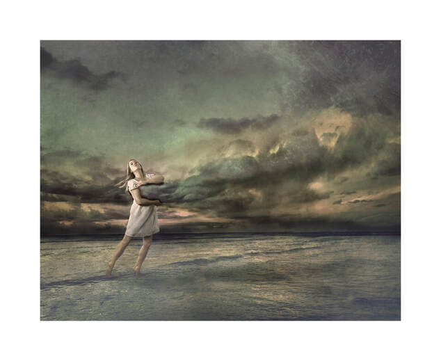 surreal fine art picture of a woman standing on the ocean with clouds coming out of her chest